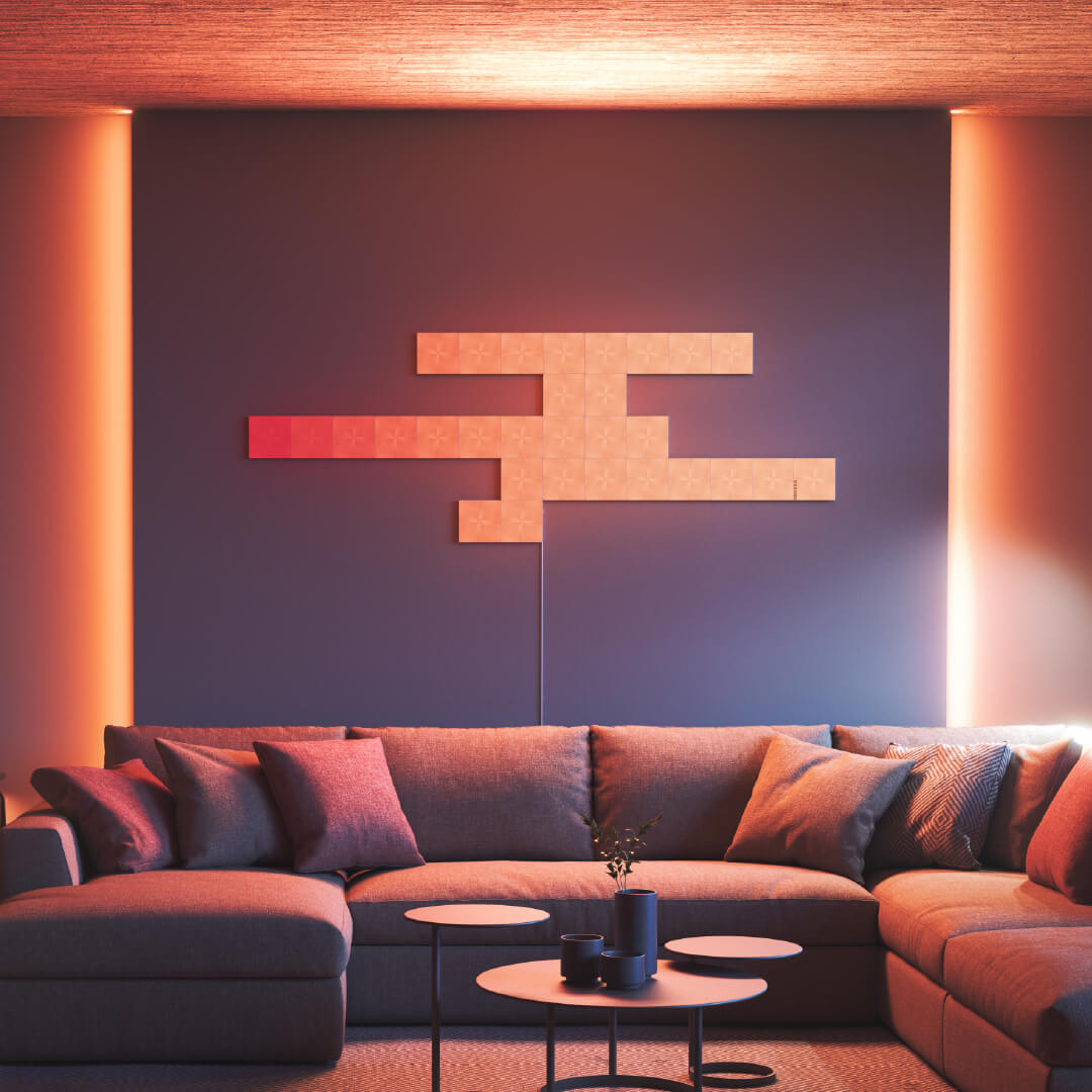Paneles de luz modulares inteligentes cuadrados que cambian de color de Nanoleaf Canvas montados en la pared de una sala de estar. Similar a Philips Hue o Lifx. HomeKit, Google Assistant, Amazon Alexa, IFTTT. 