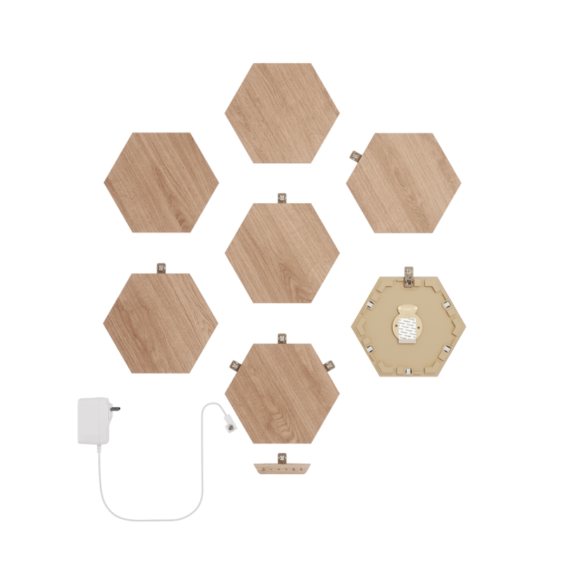 Paneles de luz modulares inteligentes hexagonales con aspecto de madera habilitados para Thread de Nanoleaf Elements. Paquete de 7. Cuenta con accesorios de paquetes de expansión y conectores flexibles. HomeKit, Google Assistant, Amazon Alexa, IFTTT. 